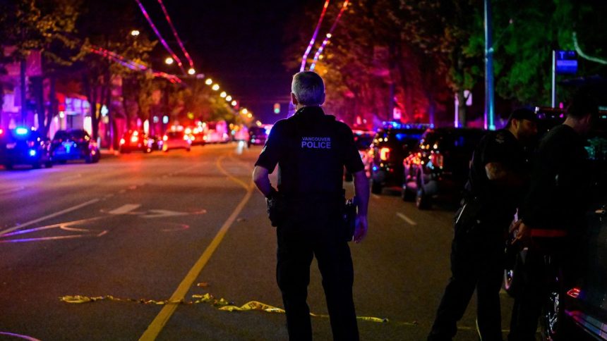 Police work on Fraser street, near the site of the Lapu Lapu day block party where a vehicle drove into a crowd killing several people in Vancouver, British Columbia, Canada April 26, 2025. REUTERS/Jennifer Gauthier