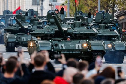 Russian tanks drive along a Moscow street on the day of a rehearsal for a military parade marking the 80th anniversary of victory over Nazi Germany, on May 3, 2025.