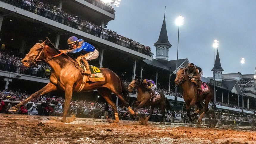 Sovereignty, ridden by jockey Junior Alvarado, crosses the finish line first to win the 151st running of the Kentucky Derby at Churchill Downs.