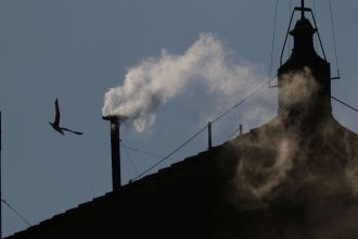 White smoke rises from the chimney on the Sistine Chapel, indicating that a new pope has been elected at the Vatican, May 8, 2025.
