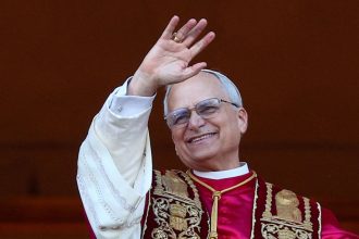 Newly elected Pope Leo XIV waves from the balcony of St. Peter's Basilica on Thursday.