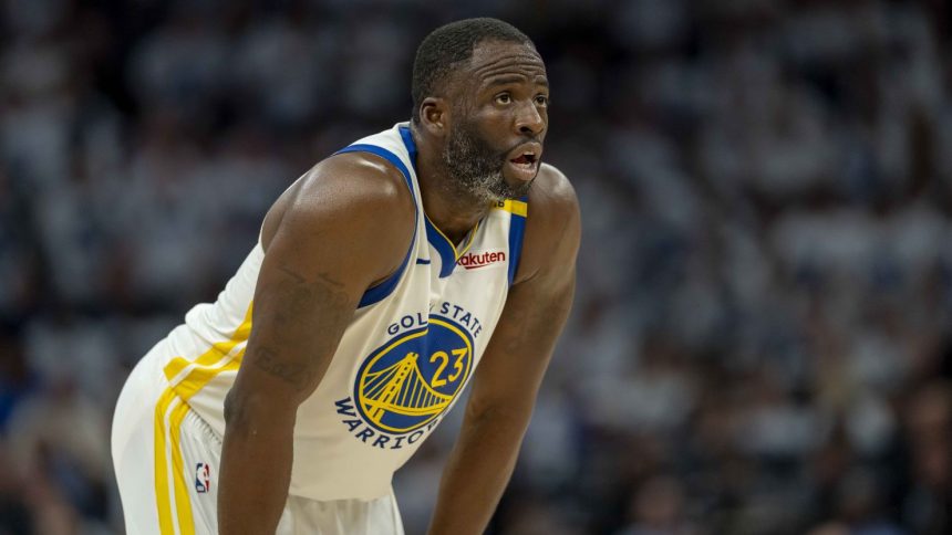 Golden State Warriors forward Draymond Green looks on against the Minnesota Timberwolves in the second half during Game 2 of the second round of the NBA playoffs at Target Center.