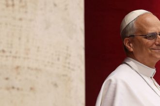 Pope Leo XIV leads a Regina Caeli prayer from the central balcony (Loggia delle Benedizioni) of St. Peter's Basilica, at the Vatican, May 11, 2025.