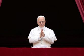 Pope Leo XIV leads a Regina Caeli prayer from the central balcony (Loggia delle Benedizioni) of St. Peter's Basilica, at the Vatican, May 11, 2025. REUTERS/Remo Casilli TPX IMAGES OF THE DAY