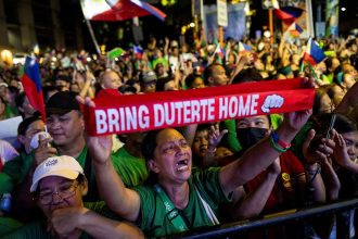 Supporters of the arrested former Philippine President Rodrigo Duterte chant his name during a solidarity rally on his birthday in Davao City, Philippines on March 28, 2025.