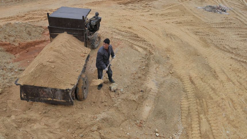 A laborer works at a rare earths mine in Nancheng county, Jiangxi province, China on March 14, 2012.