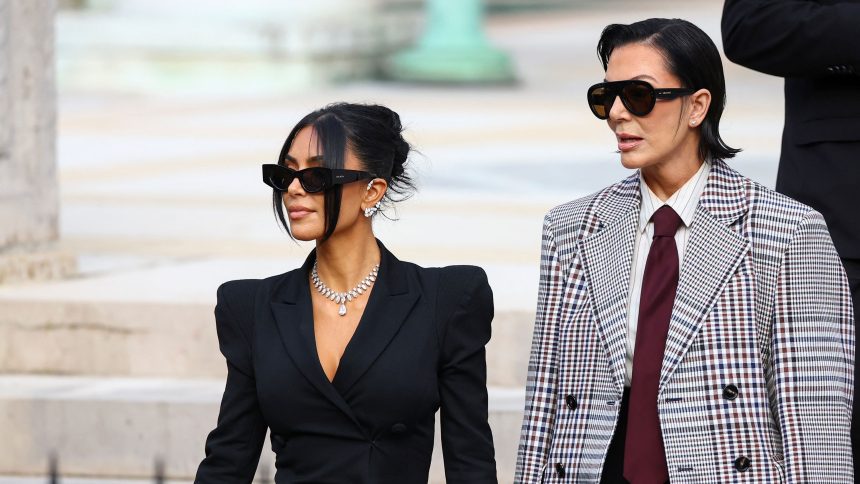 Kim Kardashian, accompanied by Kris Jenner, leaves the courthouse of the trial of 10 people accused of stealing millions of dollars worth of jewellery from her, in Paris, France, on May 13, 2025.