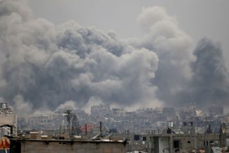 Smoke rises following Israeli strikes, in Jabalya in the northern Gaza Strip, May 15, 2025.