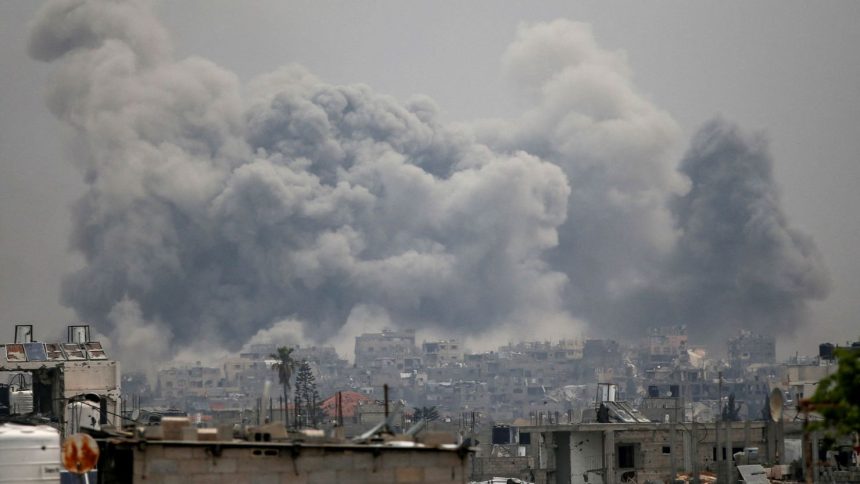 Smoke rises following Israeli strikes, in Jabalya in the northern Gaza Strip, May 15, 2025.