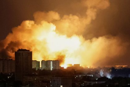 An explosion of a drone lights up the sky over the city during a Russian drone strike in Kyiv, Ukraine, on May 24, 2025.