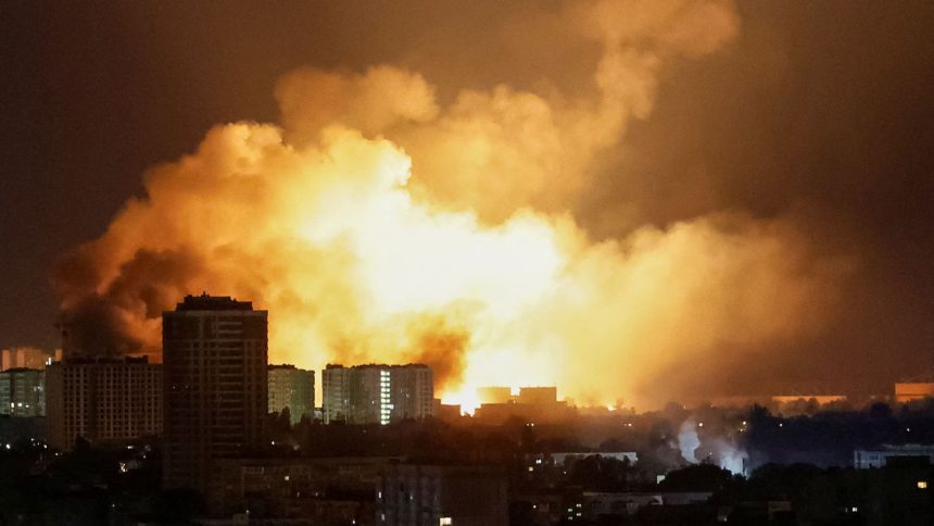 An explosion of a drone lights up the sky over the city during a Russian drone strike in Kyiv, Ukraine, on May 24, 2025.
