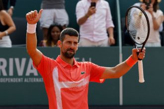 Novak Djokovic celebrates after winning the Geneva Open.