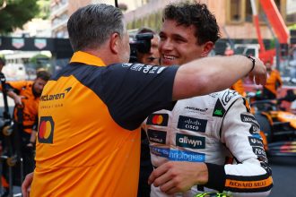 Lando Norris celebrates with McLaren chief executive Zak Brown after winning the Monaco Grand Prix.