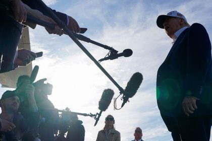 President Donald Trump speaks to the media before boarding Air Force One as he departs for Washington, DC, at Morristown Municipal Airport in Morristown, New Jersey, on May 25.