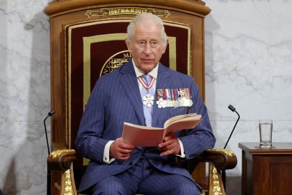 Britain's King Charles delivers a speech from the throne next to Canada's Prime Minister Mark Carney at the Senate Chamber in Ottawa, Ontario, Canada, May 27, 2025.  REUTERS/Blair Gable/Pool