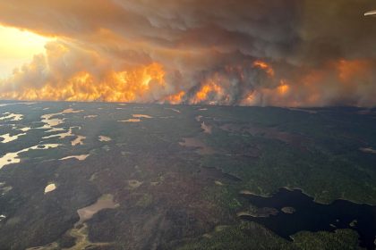Smoke rises from wildfire WE024 in Flin Flon, Manitoba, Canada on May 27.