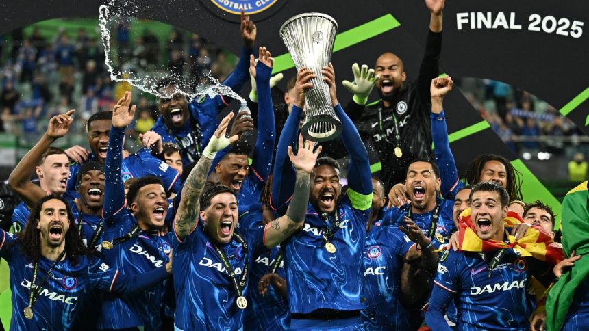 Chelsea's Reece James lifts the trophy after winning the Conference League.