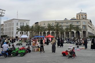 People walk in Martyr's square in Libya's capital Tripoli on May 10, 2025.
