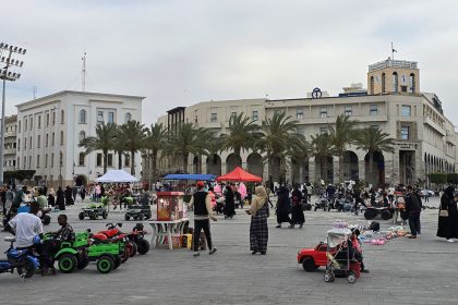 People walk in Martyr's square in Libya's capital Tripoli on May 10, 2025.