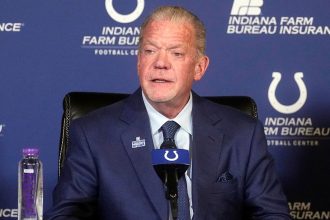 Indianapolis Colts owner Jim Irsay speaks during a news conference in 2022.