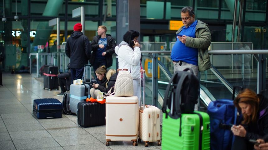 Stranded passengers at Heathrow Terminal 5 in London. More than 1,300 flights to and from Heathrow Airport will be disrupted on Friday due to the closure of the airport following a fire at the North Hyde electrical substation last night. Picture date: Friday March 21, 2025.