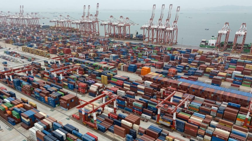 Shipping containers are ready for transport in China's Guangdong province on April 17.