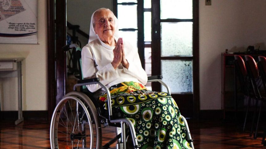 Sister Inah Canabarro Lucas, pictured in February 2024, puts her hands together in prayer.