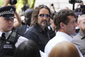 Russell Brand arriving at Westminster Magistrates' Court, London, on Friday.