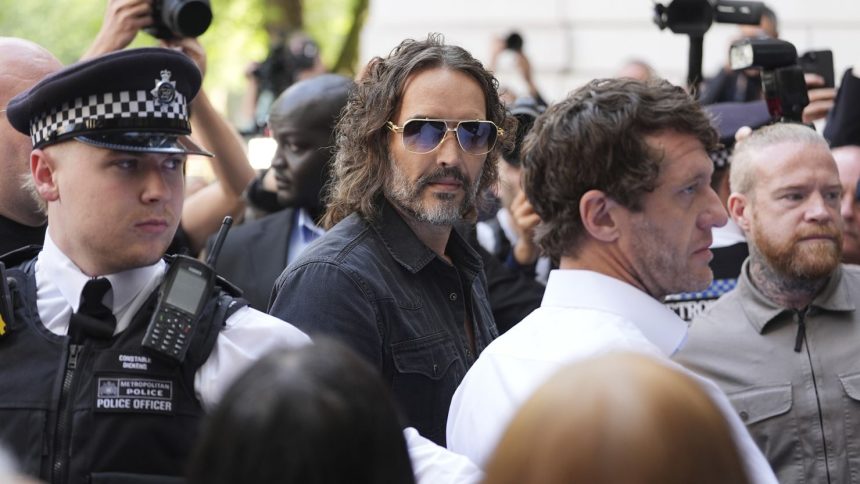 Russell Brand arriving at Westminster Magistrates' Court, London, on Friday.