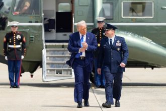 President Donald Trump prepares to board Air Force One on May 12, 2025 at Joint Base Andrews, Maryland, ahead of his trip to the Middle East.