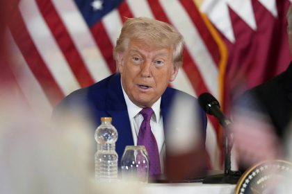 US President Donald Trump gestures during a business roundtable in Doha, Qatar on Thursday.