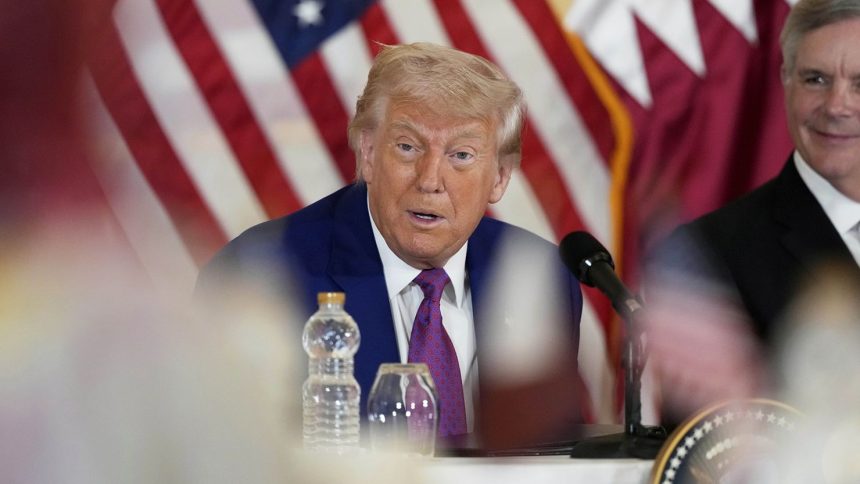 US President Donald Trump gestures during a business roundtable in Doha, Qatar on Thursday.
