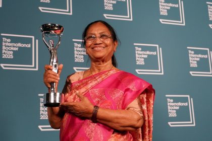 Banu Mushtaq, author of 'Heart Lamp' holds the trophy after winning the International Booker Prize, in London