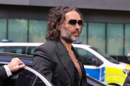 Russell Brand arrives at Southwark Crown Court in London, where he is charged with rape and sexual assault, on Friday.