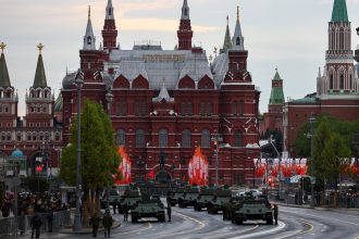 T-34 Soviet-era tanks are seen in a street near near the State Historical Museum and the Kremlin wall on the day of a rehearsal for a military parade, which marks the 80th anniversary of the victory over Nazi Germany in World War II in central Moscow on April 29.