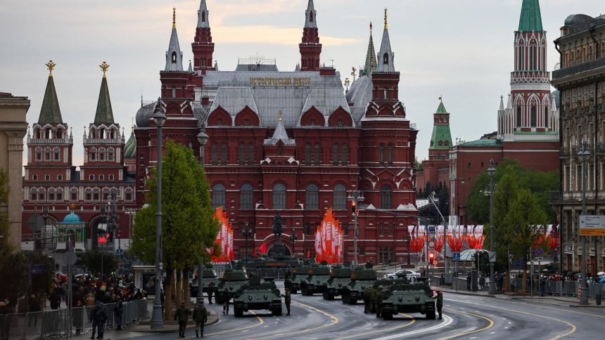 T-34 Soviet-era tanks are seen in a street near near the State Historical Museum and the Kremlin wall on the day of a rehearsal for a military parade, which marks the 80th anniversary of the victory over Nazi Germany in World War II in central Moscow on April 29.