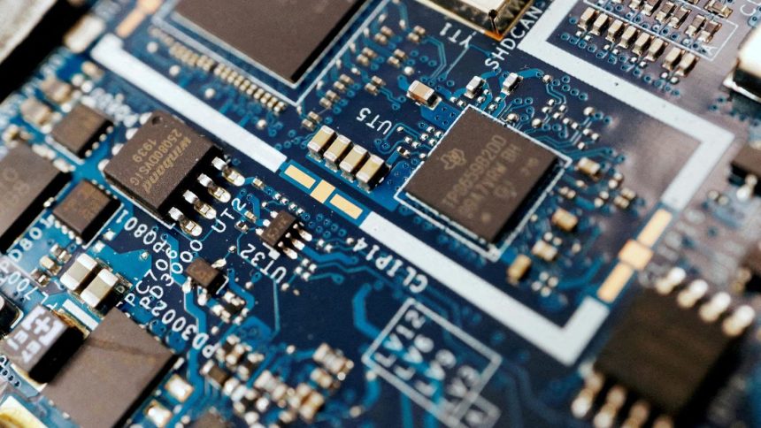 Semiconductor chips are seen on a circuit board of a computer on February 25, 2022.