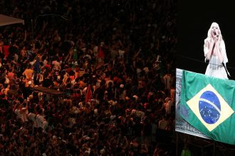 People gather to attend the Lady Gaga's open concert, in Copacabana beach in Rio de Janeiro, Brazil on May 3.