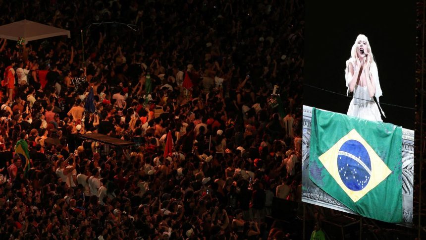 People gather to attend the Lady Gaga's open concert, in Copacabana beach in Rio de Janeiro, Brazil on May 3.