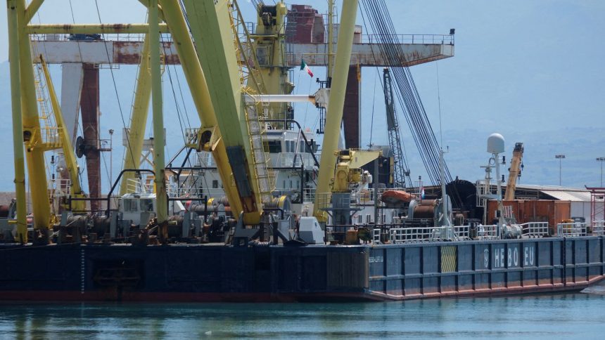The floating crane ship HEBO LIFT 10, which will recover the "Bayesian" yacht of British tech entrepreneur Mike Lynch, is docked at the port of Termini Imerese ahead of the salvage operation off Porticello, near Palermo, Italy on May 3.