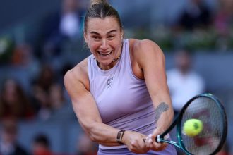 Belarus' Aryna Sabalenka returns the ball to US' Coco Gauff during their 2025 WTA Tour Madrid Open tennis tournament singles final match at the Caja Magica in Madrid, on May 3.