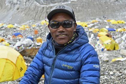 Kami Rita Sherpa poses for a picture at Everest Base Camp in 2021.