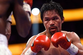 Manny Pacquiao fights Yordenis Ugas in a WBA Welterweight Championship bout in Las Vegas on August 21, 2021.