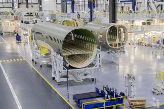 The fuselage of an Airbus A220 at the Airbus Canada LP pre-assembly plant in Mirabel, Quebec, Canada, on April 14, 2022.