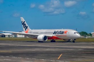 A Jetstar passenger plane prepares for take-off at the I Gusti Ngurah Rai International Airport in Denpasar on Indonesia's resort island of Bali on May 13, 2023.