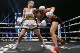 Georgia O'Connor (left) punches Erica Juana Gabriela Álvarez during their super-welterweight contest at Utilita Arena on April 2, 2022.