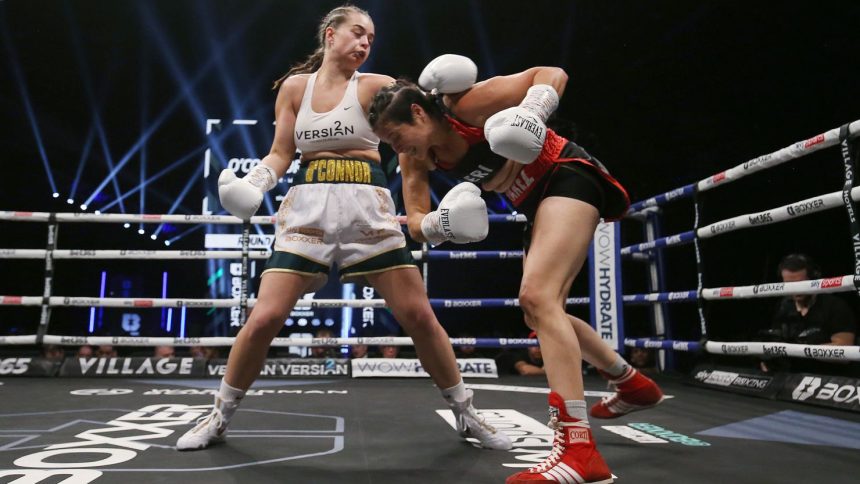Georgia O'Connor (left) punches Erica Juana Gabriela Álvarez during their super-welterweight contest at Utilita Arena on April 2, 2022.