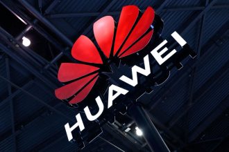 Huawei's logo during the 2023 World Artificial Intelligence Conference in Shanghai.