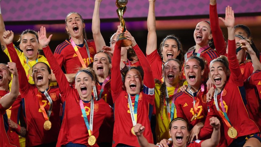 Ivana Andres of Spain lifts the World Cup trophy following victory after the FIFA Women's World Cup Australia & New Zealand 2023 Final.