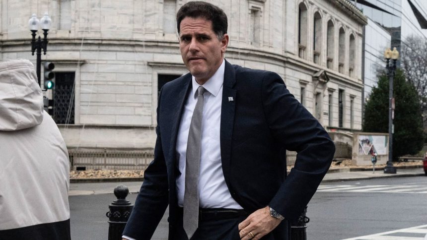 Israel's Minister for Strategic Affairs, Ron Dermer, looks on as he walks into the Executive Office Building next to the White House in Washington, DC on December 26, 2023.